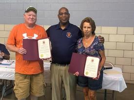 Left to Right: Cobb Island Assistant Chief Bobby Higgs, Randy Smith, Hughesville's Beverly Jarboe
